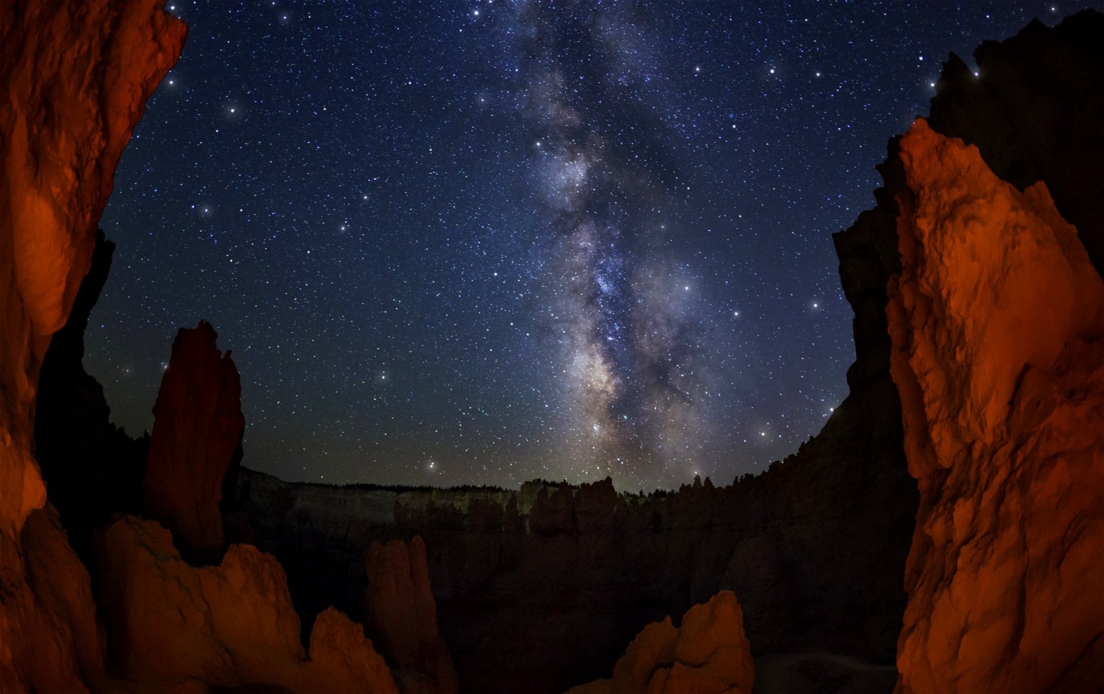 Private Deck with Stargazing Views: Stargaze from the private deck of a glamping tent at a certified DarkSky resort near Bryce Canyon National Park.