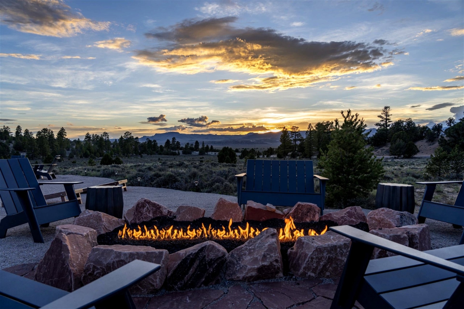 Sunset on Private Deck: Enjoy breathtaking sunsets from the private deck of a luxury glamping tent near Bryce Canyon, Utah, with majestic wilderness views.