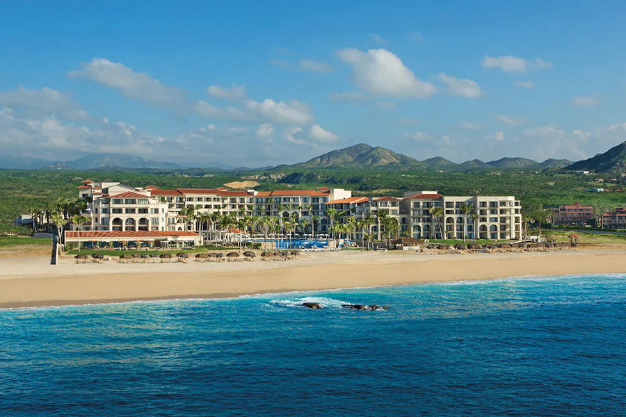 Elegant oceanfront resort with sprawling golden beaches and world-class golf courses, nestled in the scenic beauty of Los Cabos.