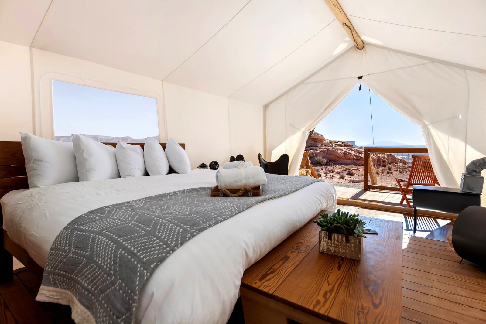 Upscale Glamping Tent at Lake Powell: Stay in an upscale glamping tent perched on a canyon rim plateau at Lake Powell, Utah, offering stunning views and luxury amenities.