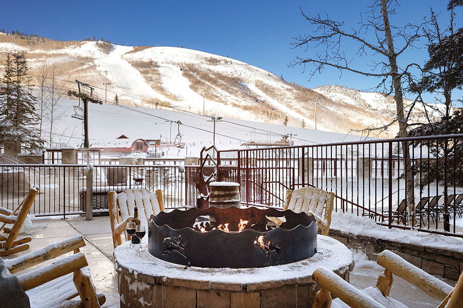 Cozy outdoor fire pit at Marriott’s Mountainside, Park City, perfect for après-ski relaxation.