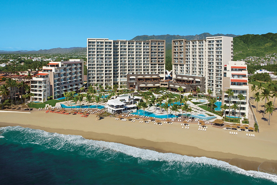 Contemporary beachfront resort with breathtaking ocean views, luxurious accommodations, and vibrant nightlife, located in Puerto Vallarta